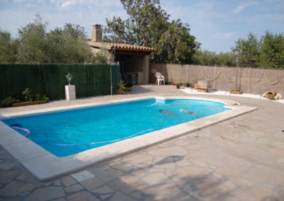 Construcció de piscina amb barbacoa