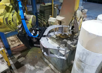 Reprogramació de robot i fabricació de garra